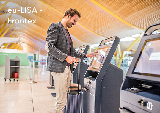 man in airport on checking machine 